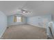 Large bonus room with vaulted ceiling, carpeting, a ceiling fan, and natural light, ideal for recreation or a home office at 5618 Wade Park Blvd, Raleigh, NC 27607