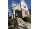 Stylish home exterior with brick facade, welcoming entrance, and manicured landscaping at 5618 Wade Park Blvd, Raleigh, NC 27607