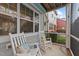 Inviting front porch with rocking chairs, perfect for relaxing and enjoying the neighborhood view at 5618 Wade Park Blvd, Raleigh, NC 27607