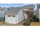 Attached garage showcasing a well-maintained exterior and convenient access to the home at 5618 Wade Park Blvd, Raleigh, NC 27607