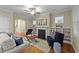 Comfortable living room with a fireplace, built-in shelves, and cozy seating at 5618 Wade Park Blvd, Raleigh, NC 27607