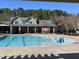 Community pool with an outdoor lounging area, perfect for relaxation and socializing at 5618 Wade Park Blvd, Raleigh, NC 27607