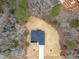 Aerial view of the home and its surrounding trees at 605 Shawnee Dr, Louisburg, NC 27549