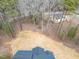 Aerial view of the top of the home and surrounding bare trees at 605 Shawnee Dr, Louisburg, NC 27549