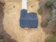 Aerial view of the home featuring the driveway and landscaping at 605 Shawnee Dr, Louisburg, NC 27549