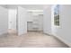 Bedroom with a closet and adjoining walk-in closet with built-in shelving at 605 Shawnee Dr, Louisburg, NC 27549