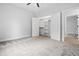 Bedroom with closet, carpeted floor, and ceiling fan at 605 Shawnee Dr, Louisburg, NC 27549
