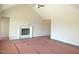 Spacious living room with vaulted ceiling and modern fireplace at 622 Tart Town Rd, Dunn, NC 28334