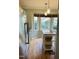 Bright kitchen featuring stainless steel appliances, island, and bay windows at 6520 Thetford Ct, Raleigh, NC 27615