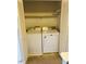 Convenient laundry closet with a side-by-side washer and dryer setup at 6520 Thetford Ct, Raleigh, NC 27615