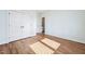 Bedroom with hardwood floors, closet, and attached bathroom at 654 Christian Light Rd, Fuquay Varina, NC 27526
