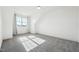 Bright bedroom featuring neutral walls and carpet at 654 Christian Light Rd, Fuquay Varina, NC 27526