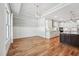 Gourmet kitchen features a large center island with granite countertops, stainless steel appliances, and pendant lighting at 654 Christian Light Rd, Fuquay Varina, NC 27526