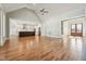 Spacious open floor plan featuring hardwood floors, high ceilings, and seamless flow into the kitchen at 654 Christian Light Rd, Fuquay Varina, NC 27526