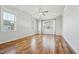 Spacious bedroom with hardwood floors and abundant natural light at 654 Christian Light Rd, Fuquay Varina, NC 27526