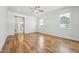 Open bedroom with hardwood floors and attached bathroom at 654 Christian Light Rd, Fuquay Varina, NC 27526