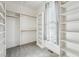 Bright walk-in closet featuring custom shelving and ample storage space at 654 Christian Light Rd, Fuquay Varina, NC 27526