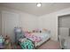 Bedroom with a collection of plush toys, dresser, and neutral colored walls at 781 Fireball Ct, Knightdale, NC 27545