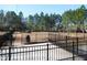 Fully fenced dog park area with ample running space and mature trees at 781 Fireball Ct, Knightdale, NC 27545