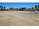 A community space with large field, covered outdoor seating, and mature trees under a clear blue sky at 781 Fireball Ct, Knightdale, NC 27545