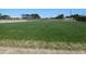 Expansive community field with marked lines for various sports and recreational activities at 781 Fireball Ct, Knightdale, NC 27545