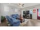 Comfortable living room featuring plush seating and hardwood floors at 781 Fireball Ct, Knightdale, NC 27545