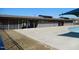 Community pool house with concrete patio area, and metal-grate fencing at 781 Fireball Ct, Knightdale, NC 27545