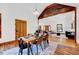 Elegant dining area with stylish decor that is open to the living room for seamless entertaining at 807 Vickers Ave, Durham, NC 27701