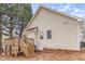 Exterior view of home featuring a wooden deck and backyard at 904 Amersham Ln, Wake Forest, NC 27587