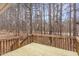 New wooden deck overlooking a private, wooded backyard at 904 Amersham Ln, Wake Forest, NC 27587