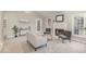 Bright living room featuring a fireplace, neutral color scheme, and ample natural light at 904 Amersham Ln, Wake Forest, NC 27587