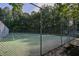 A community tennis court surrounded by a tall chain-link fence at 904 Saint Catherines Dr, Wake Forest, NC 27587