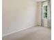 Bright bedroom featuring neutral carpeting, a window with floral curtains and natural light at 93 Fair Child Rd, Spring Lake, NC 28390