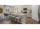 Modern eat-in kitchen featuring a center island, stainless steel appliances and hardwood floors at 93 Fair Child Rd, Spring Lake, NC 28390