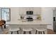 Bright kitchen featuring a large island with seating and stainless steel appliances at 93 Fair Child Rd, Spring Lake, NC 28390