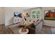 Cozy living room featuring large window views and stylish decor at 93 Fair Child Rd, Spring Lake, NC 28390