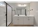 Stylish bathroom featuring a double sink vanity and modern glass shower at O Shortline Rd, Roxboro, NC 27574