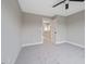 Neutral carpeted bedroom with a ceiling fan and white-trimmed doors and windows create a comfortable space at O Shortline Rd, Roxboro, NC 27574