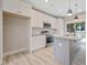 Well-equipped kitchen features stainless steel appliances, granite countertops, and white cabinetry at O Shortline Rd, Roxboro, NC 27574