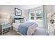 Guest bedroom with ample natural light and a serene ambiance at 100 Cloud Berry Ln, Holly Springs, NC 27540
