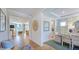 Bright foyer with hardwood floors leading to the dining room and living spaces at 100 Cloud Berry Ln, Holly Springs, NC 27540