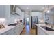 Contemporary kitchen with stainless steel appliances, modern cabinets, and an open design at 100 Cloud Berry Ln, Holly Springs, NC 27540