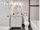 Updated bathroom featuring a white vanity, toilet, and bathtub with modern fixtures at 108 Ephesus Church Rd # 510, Chapel Hill, NC 27517