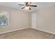 Cozy bedroom with neutral walls, carpet flooring, and a ceiling fan at 108 Ephesus Church Rd # 510, Chapel Hill, NC 27517
