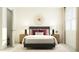Stylishly designed bedroom with modern decor, decorative wall art and matching bedside tables at 1333 Hazelnut Ridge Ln, Knightdale, NC 27545