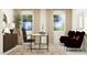 Bright, well-appointed home office with stylish furniture and ample natural light at 1333 Hazelnut Ridge Ln, Knightdale, NC 27545