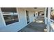 A covered front porch with wood decking and view of the neighborhood at 1409 Mcdearman Ave, Rocky Mount, NC 27804