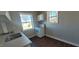 Kitchen with modern appliances, laminate countertops, and ample natural light at 1409 Mcdearman Ave, Rocky Mount, NC 27804