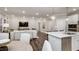 Bright, open-concept space combines the kitchen, dining, and living areas for modern living and entertaining at 1702 Red Roses Ave, Durham, NC 27703