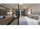 Bright bedroom with a four-poster bed, tray ceiling, a large window, and stylish decor at 1702 Red Roses Ave, Durham, NC 27703